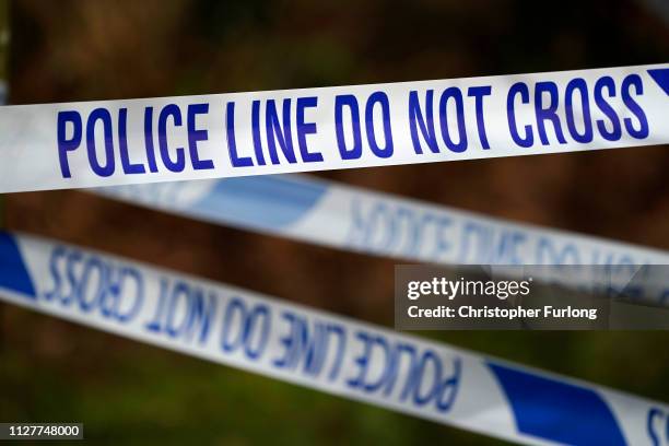 Police cordon surrounds the scene of a house fire in Sycamore Lane, Stafford, which claimed the lives of four children yesterday, on February 06,...