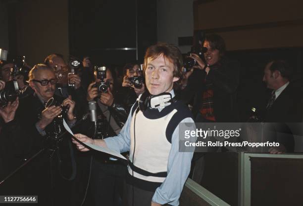 British gardener and singer, Roddy Llewellyn pictured at a press photo call wearing headphones in a recording studio prior to recording his first...