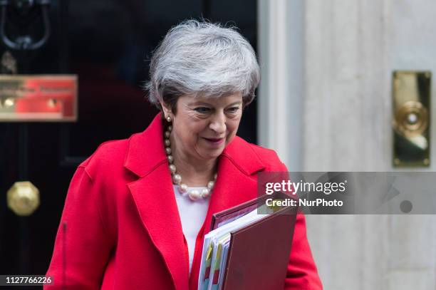 British Prime Minister Theresa May leaves 10 Downing Street in central London for the weekly PMQ session in the House of Commons on 27 February,...