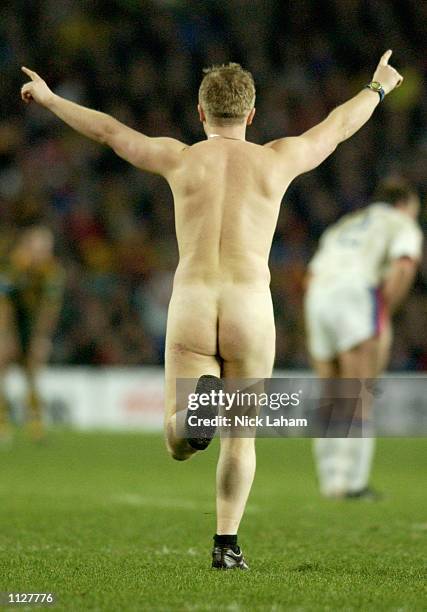 Streaker runs onto the field during the Rugby League Test match between the Australian Kangaroos and the Great Britain and Irish Lions held at Aussie...