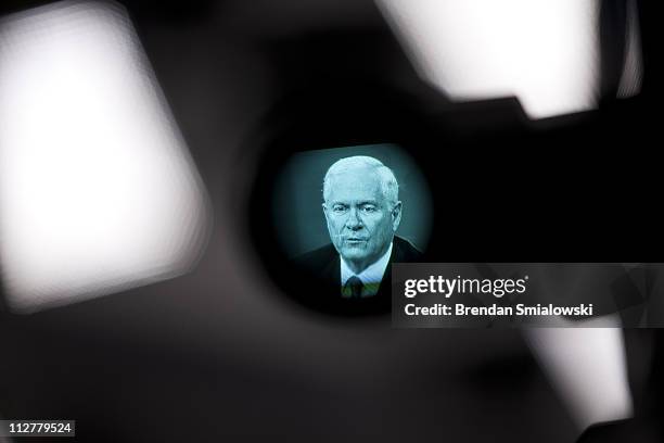 Secretary of Defense Robert M. Gates is seen in a viewfinder speaking during a briefing at the Pentagon April 21, 2011 in Arlington, Virginia....