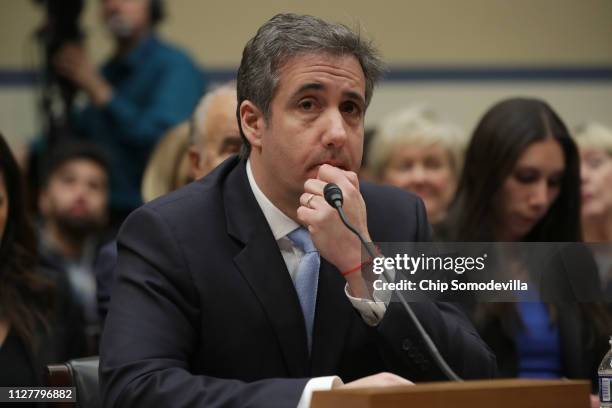 Michael Cohen, former attorney and fixer for President Donald Trump testifies before the House Oversight Committee on Capitol Hill February 27, 2019...