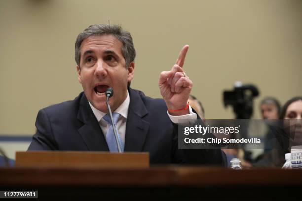 Michael Cohen, former attorney and fixer for President Donald Trump testifies before the House Oversight Committee on Capitol Hill February 27, 2019...