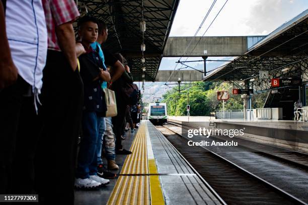Photo shows people wait for the subway at one of the stations of the system in Medellin, Colombia on February 21, 2019.