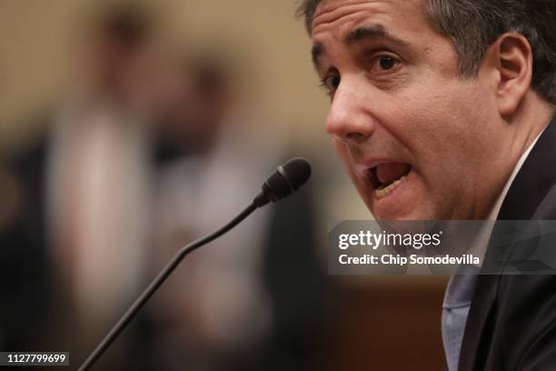 Michael Cohen, former attorney and fixer for President Donald Trump testifies before the House Oversight Committee on Capitol Hill February 27, 2019...