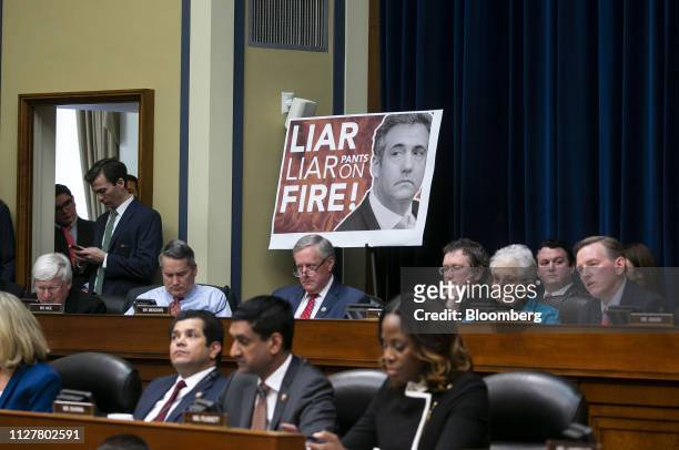Representative Mark Meadows, a Republican from North Carolina, center, listens during a hearing with Michael Cohen, former personal lawyer to U.S....