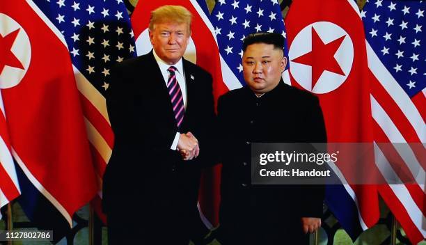 Handout photo of U.S. President Donald Trump and North Korean leader Kim Jong-un during their second summit meeting at the Sofitel Legend Metropole...