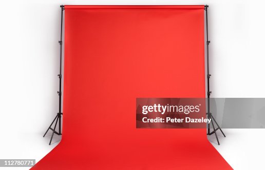 Red photographers backdrop in studio Red photographers backdrop in studio