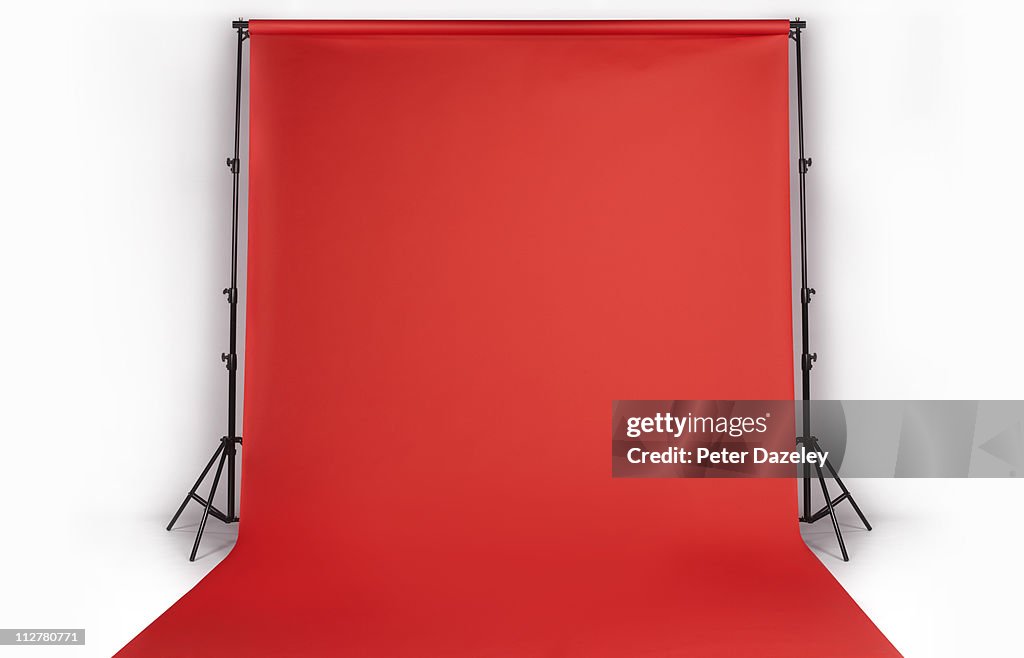 Red photographers backdrop in studio
