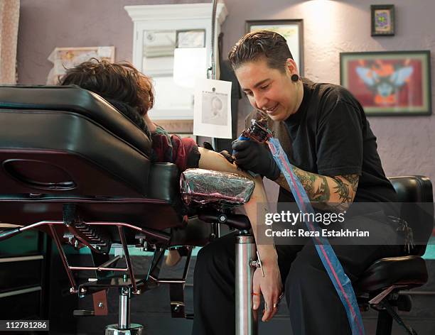 tatto in process of application - tattooing stock pictures, royalty-free photos & images