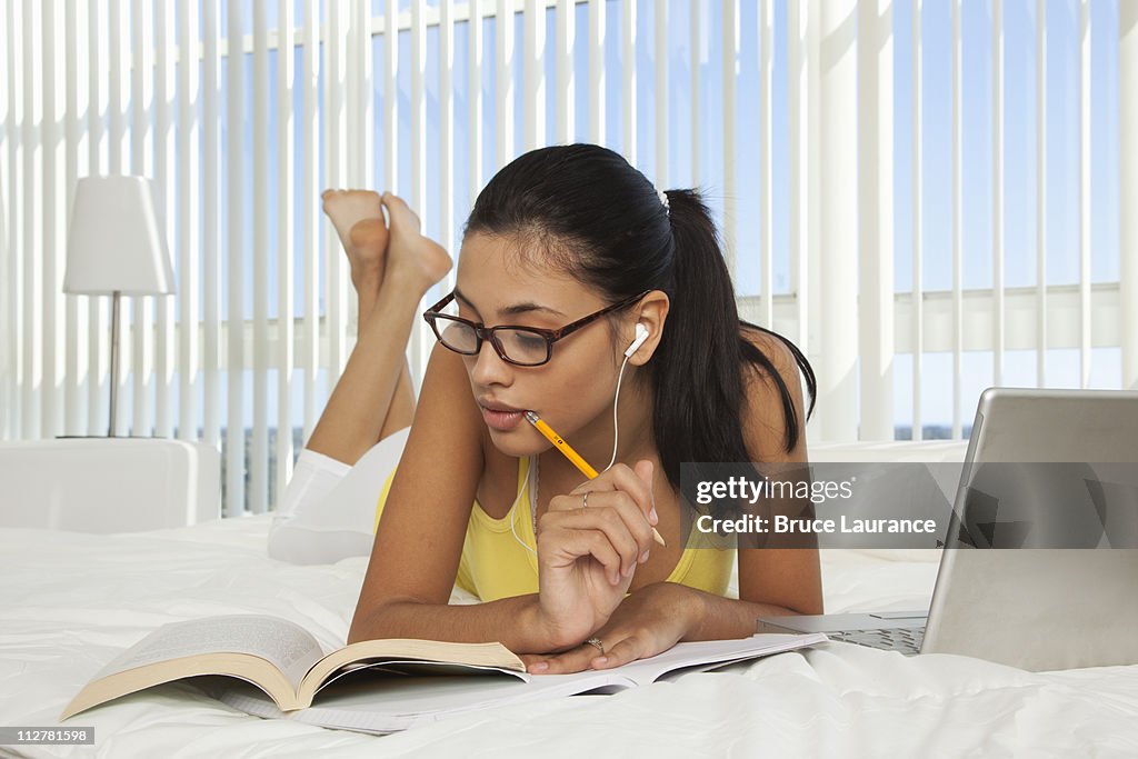 Hispanic girl doing homework