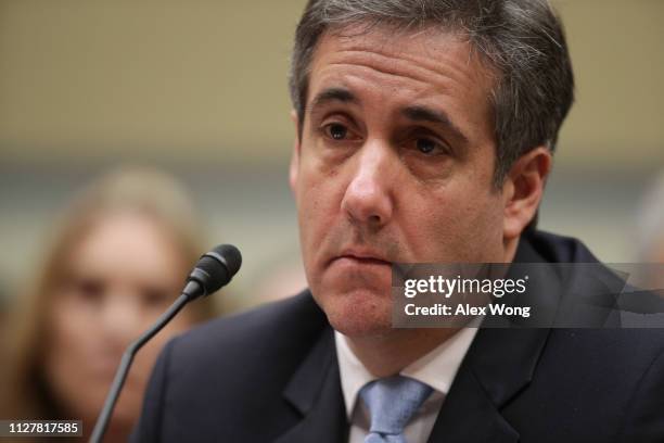 Michael Cohen, former attorney and fixer for President Donald Trump testifies before the House Oversight Committee on Capitol Hill February 27, 2019...