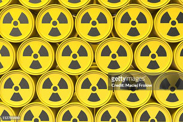 wall made of barrels with radioactive symbol - radioactive wallpaper stock-grafiken, -clipart, -cartoons und -symbole