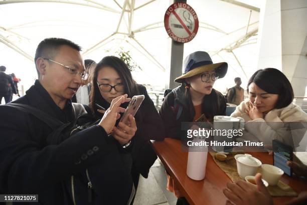 Group of Chinese tourists stranded at Terminal 3, Indira Gandhi International Airport after their flight to Lahore was cancelled due to the air space...