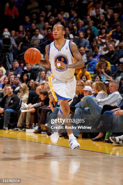 Monta Ellis of the Golden State Warriors dribbles the ball against the Dallas Mavericks on April 2, 2011 at Oracle Arena in Oakland, California. NOTE...