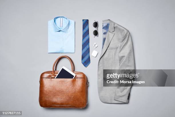 formalwear arranged on gray background - shirt foto e immagini stock