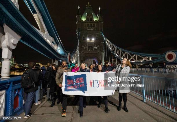 Farhan Akhtar attend a march for the 'ItsNotOk' Light Up The Night London for National Abuse and Sexual Violence Awareness Week at Tower Bridge on...