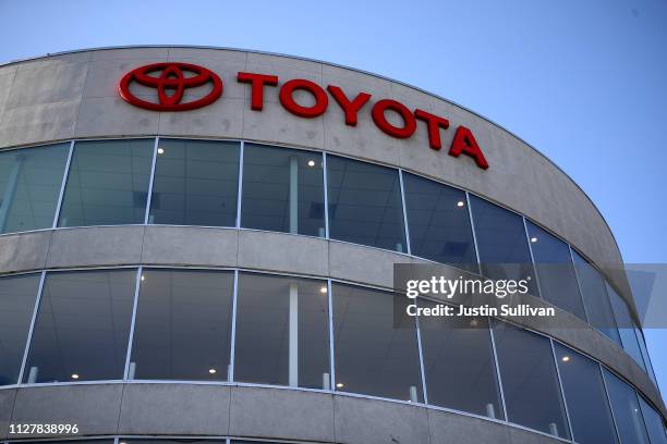 The Toyota logo is displayed at One Toyota of Oakland on February 06, 2019 in Oakland, California. Toyota reported a $12.6 billion loss in third...