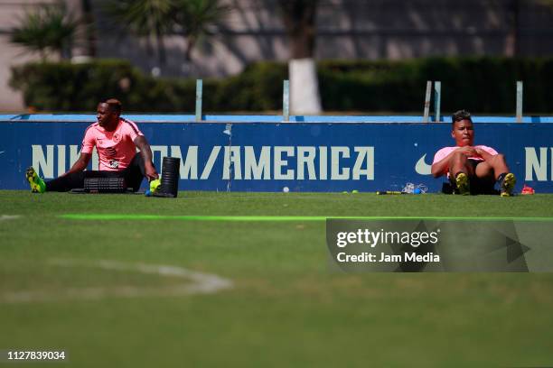 Alex Renato Ibarra and Roger Martinez of America warm up during the Club America training session at Club America facilities on February 6, 2019 in...