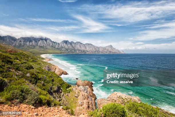 indian ocean meets land in south africa - western cape province stock pictures, royalty-free photos & images