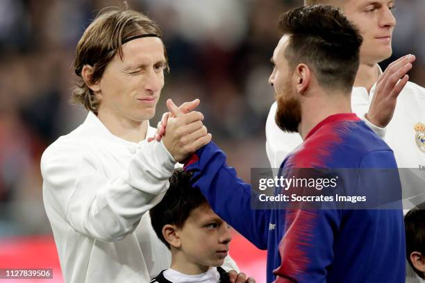 Luka Modric of Real Madrid, Lionel Messi of FC Barcelona during the Spanish Copa del Rey match between Real Madrid v FC Barcelona at the Santiago...