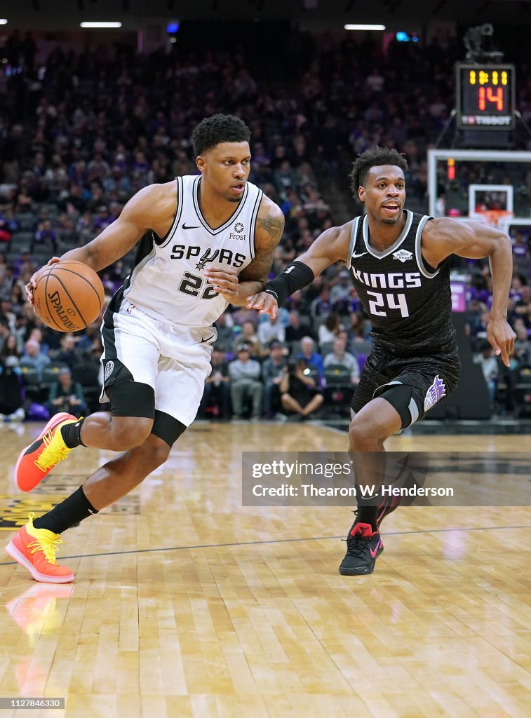 King Rudy Rudy Gay of the San Antonio Spurs drives on Buddy Hield of the... News ...