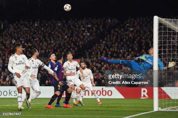 Keylor Navas of Real Madrid CF makes a save during the Copa del Semi Final first leg match between Barcelona and Real Madrid at Nou Camp on February...