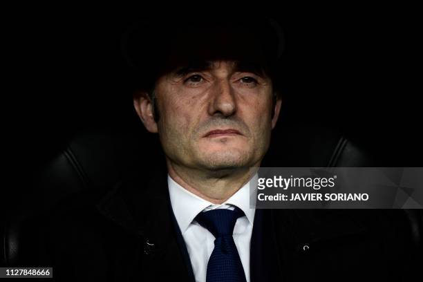 Barcelona's Spanish coach Ernesto Valverde looks on during the Spanish Copa del Rey semi-final second leg football match between Real Madrid and...