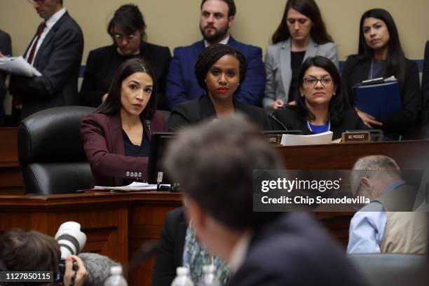 Rep. Alexandria Ocasio-Cortez , Rep. Ayanna Pressley and Rep. Rashida Tlaib listen as Michael Cohen, former attorney and fixer for President Donald...