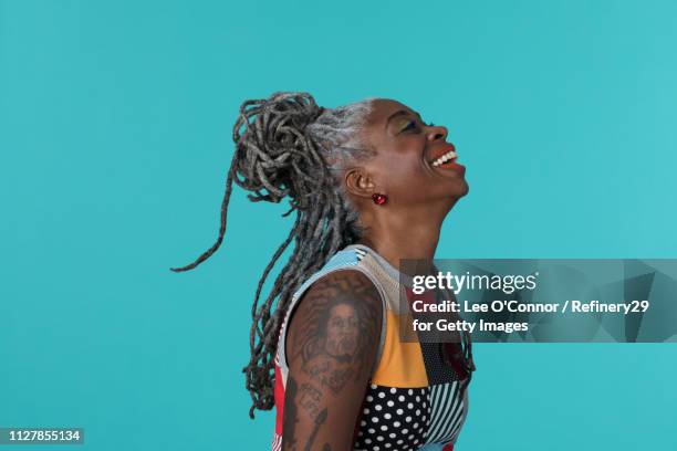 portait of confident african american woman laughing - beautiful older black women stock pictures, royalty-free photos & images