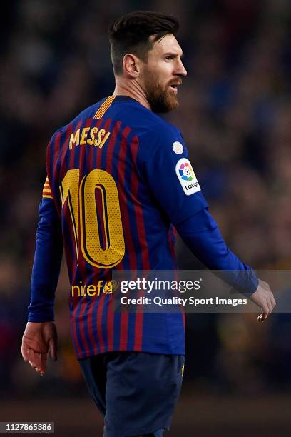 Lionel Messi of FC Barcelona looks on during the Copa del Rey Semi Final first leg match between FC Barcelona and Real Madrid at Nou Camp on February...