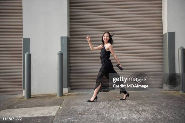 the portrait of a young asian lady - geschäftsfrau kleid stock-fotos und bilder