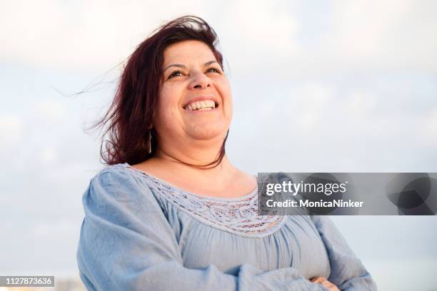 happy mature hispanic woman - fat monica stock pictures, royalty-free photos & images