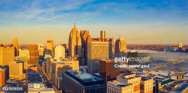 detroit downtown michigan at sunset in winter - detroit skyline stock pictures, royalty-free photos & images