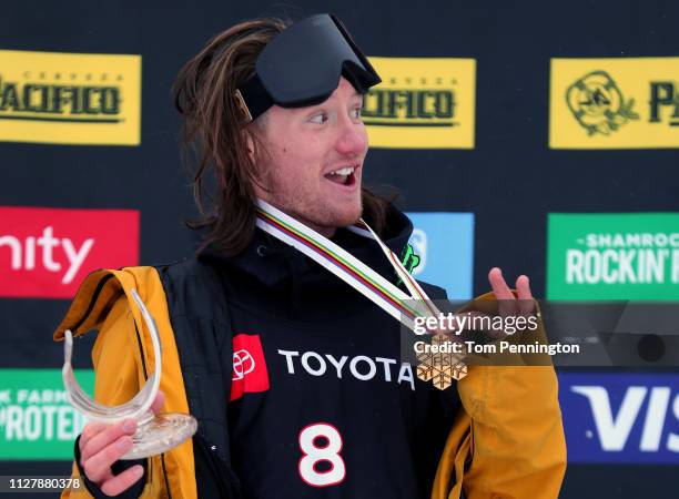 James Woods in first place celebrates on the podium for the Men's Ski Slopestyle Final at the FIS Freestyle Ski World Championships on February 06,...