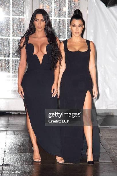 Kim Kardashian and Kourtney Kardashian at the amfAr Gala held at Cipriani Wall St on February 6, 2019 in New York City.