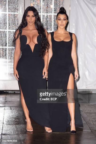 Kim Kardashian and Kourtney Kardashian at the amfAr Gala held at Cipriani Wall St on February 6, 2019 in New York City.