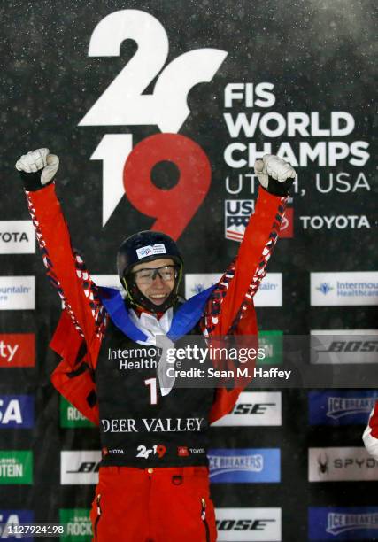 Maxim Burov of Russia in first place celebrates on the podium during the Men's Aerials Final at the FIS Freestyle Ski World Championships on February...