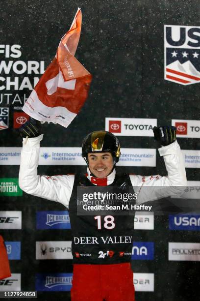 Noe Roth of Switzerland in third place celebrates on the podium during the Men's Aerials Final at the FIS Freestyle Ski World Championships on...