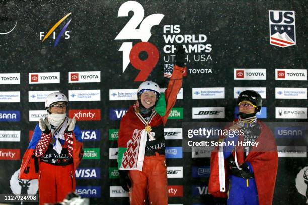 Nikitina Liubov of Russia second place, Aliaksandra Ramanouskaya of Belarus first place and Mengtao Xu of China in third place celebrate on the...