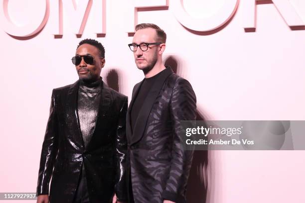 Billy Porter and Adam Smith attend Tom Ford FW19 Fashion Show at Park Avenue Armory on February 06, 2019 in New York City.