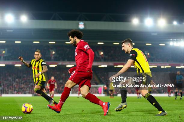 Mohamed Salah of Liverpool and Sebastian Prodl of Watford during the Premier League match between Liverpool FC and Watford FC at Anfield on February...