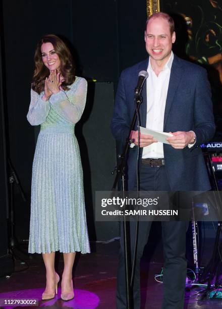 Britain's Prince William, Duke of Cambridge and Britain's Catherine, Duchess of Cambridge visit the Empire Music Hall in Belfast, Northern Ireland on...