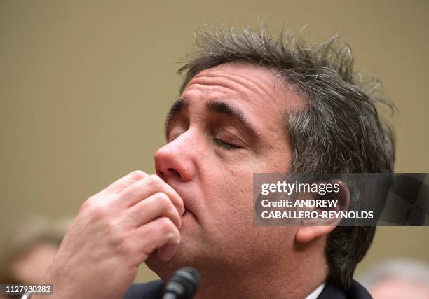 Michael Cohen, US President Donald Trump's former personal attorney, finishes his testimony before the House Oversight and Reform Committee in the...