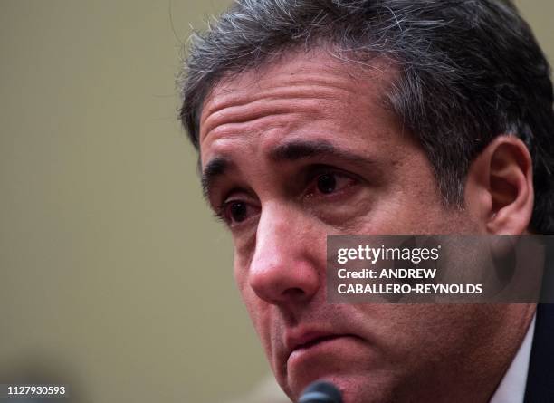Michael Cohen, US President Donald Trump's former personal attorney, testifies before the House Oversight and Reform Committee in the Rayburn House...