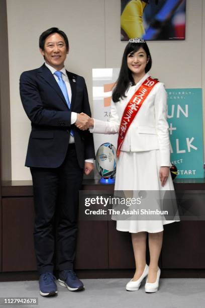 Japan Sports Agency Commissioner Daichi Suzuki shakes hands with Ms. Nippon winner Aiko Watarai on February 6, 2019 in Tokyo, Japan.
