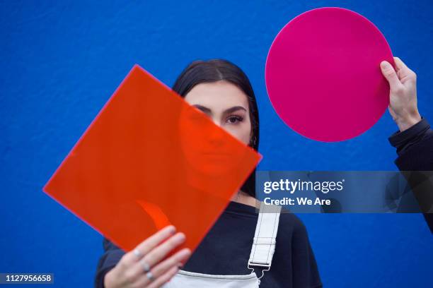 Young woman with geometric shapes.