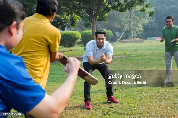 playing cricket - stock images - indian boy standing stock pictures, royalty-free photos & images