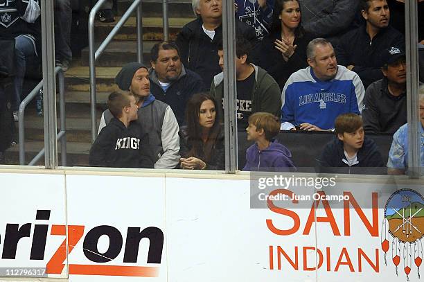 David and Victoria Beckham watch the action between the San Jose Sharks against the Los Angeles Kings in Game Four of the Western Conference...