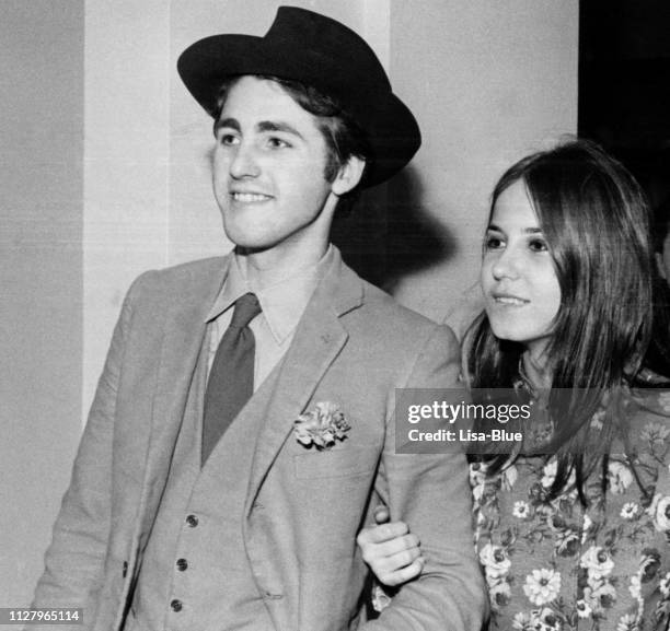 young couple in 1970. black and white. - vintage dress stock pictures, royalty-free photos & images